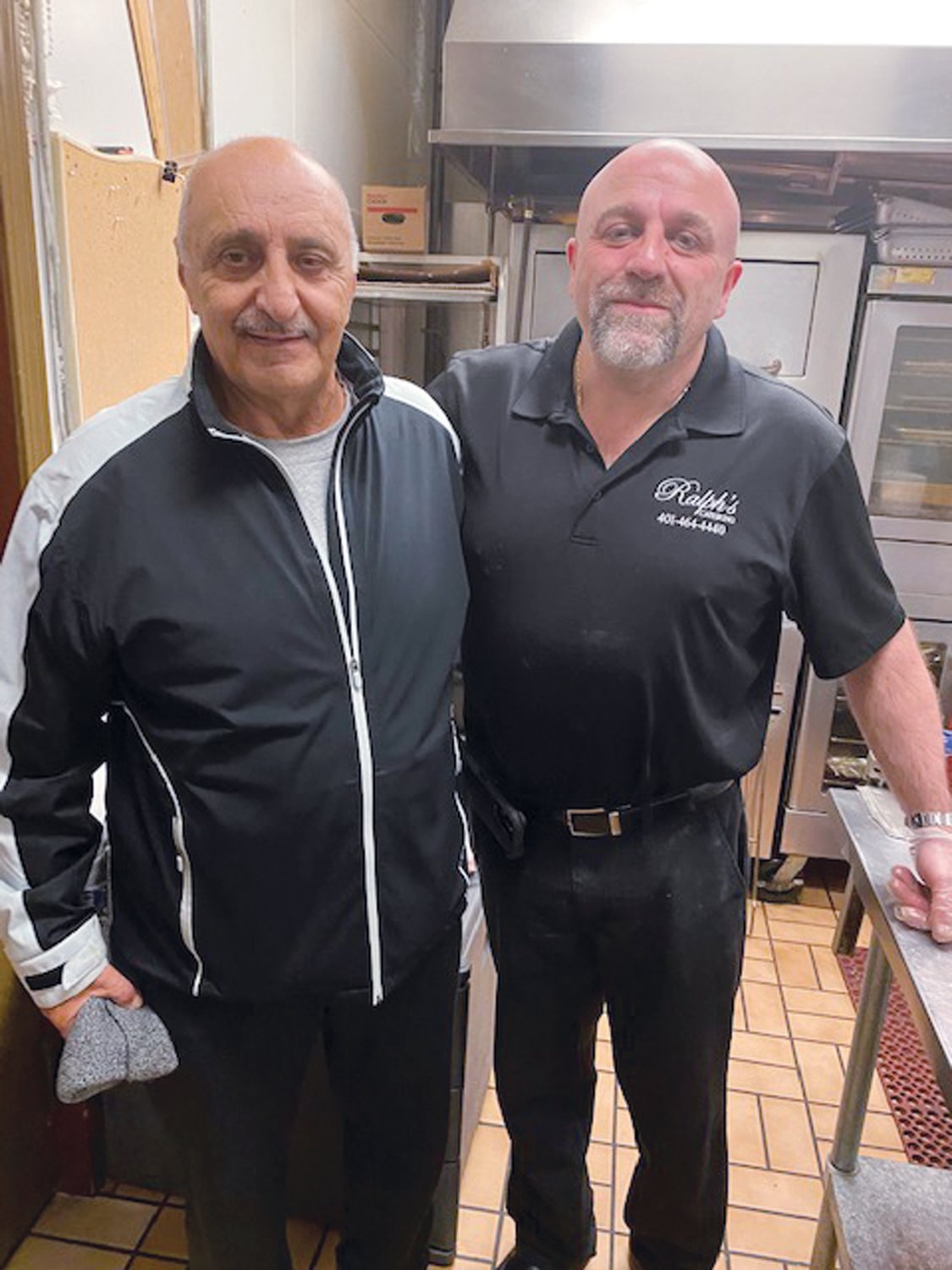 FUNDRAISING FRIENDS: Vin LaFazia (left), who has been a co-chairperson for many previous Ricky Salzillo Memorial Game Dinners, is joined by Ralph DeFusco of Ralph’s Kitchen and Catering fame who will prepare and cook this year’s food fest inside the Santa Maria DePrate Hall in Cranston.